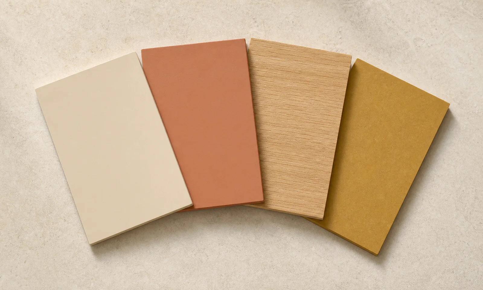 Four Warm pack chips — Sand, Terracotta, Miel oak, and Ochre