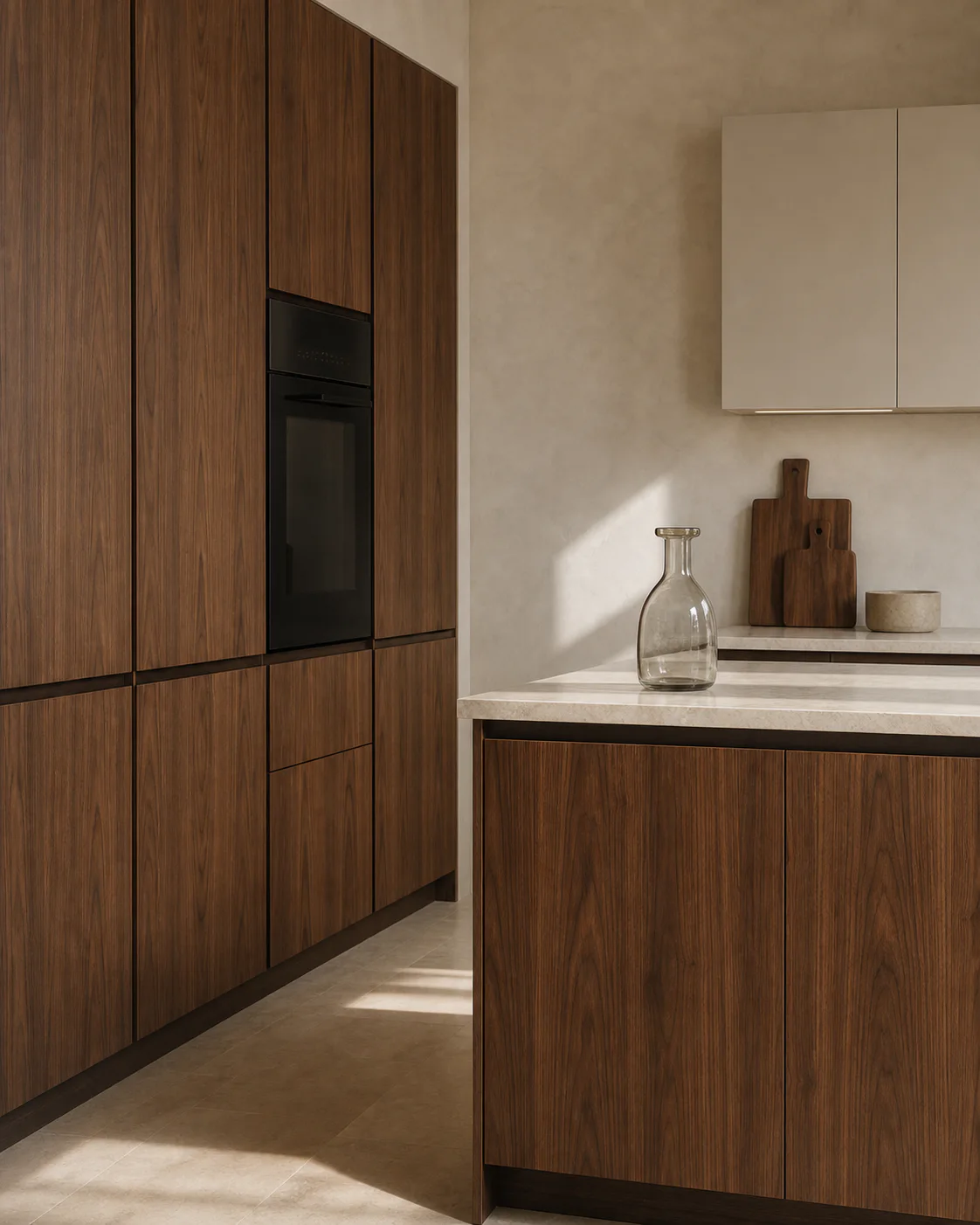 Velora concept with full-height walnut pantry fronts, integrated ovens, a walnut island, and warm mineral worktops